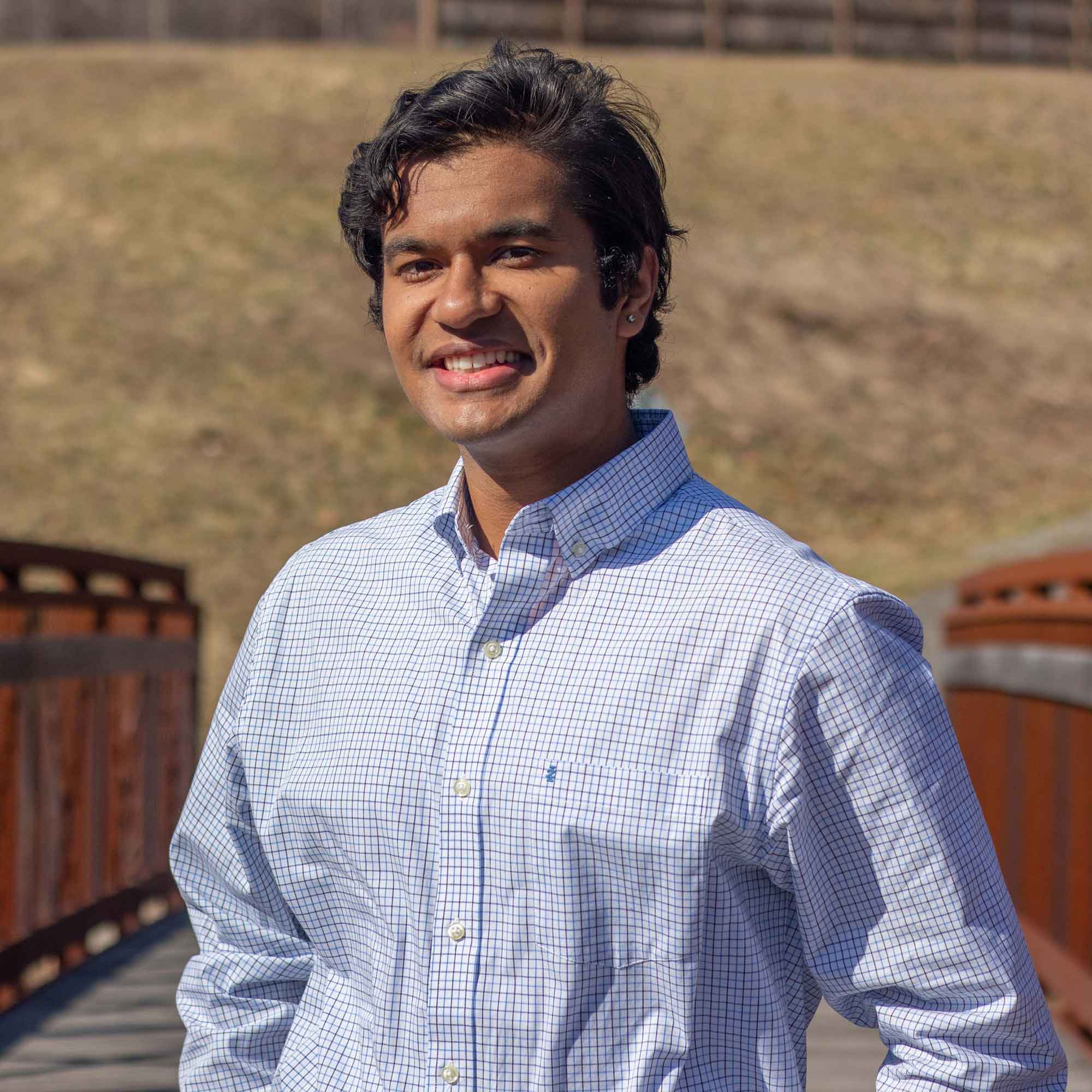 Thapaliya Anubhav stands on a bridge in Richmond